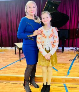 Lana Ricci with her student