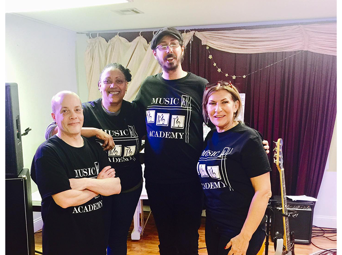 Lana with several of her teachers